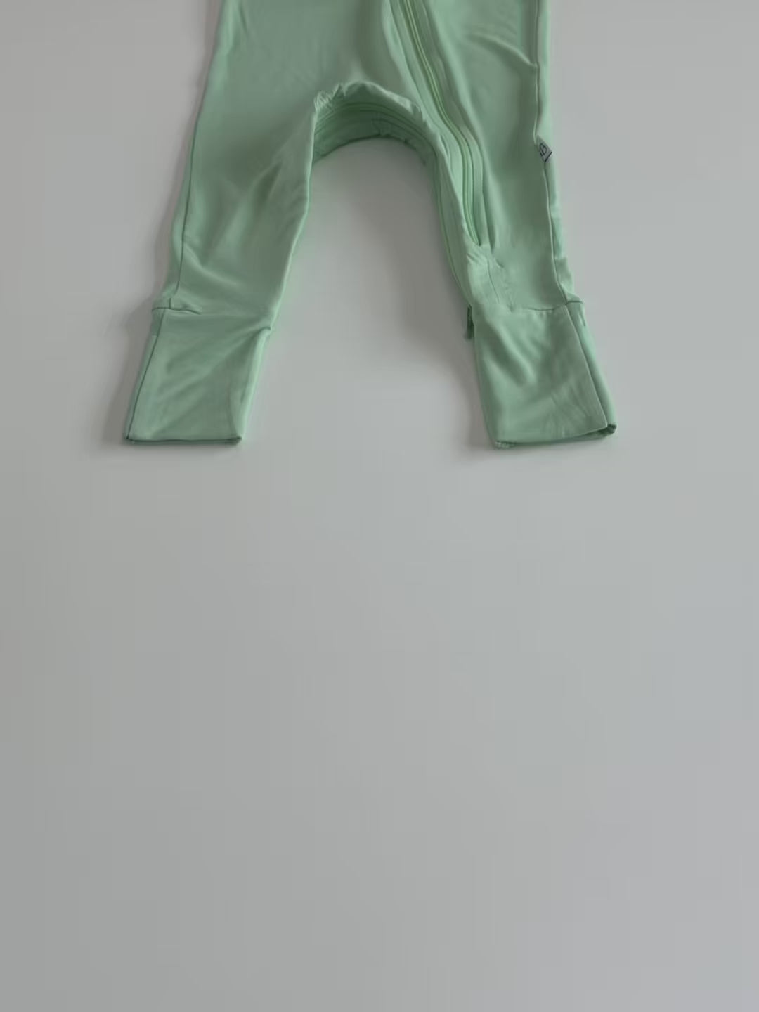 Bunnybino bamboo baby overall with double zippers and fold-over hands and feet, soft and gentle on delicate skin.